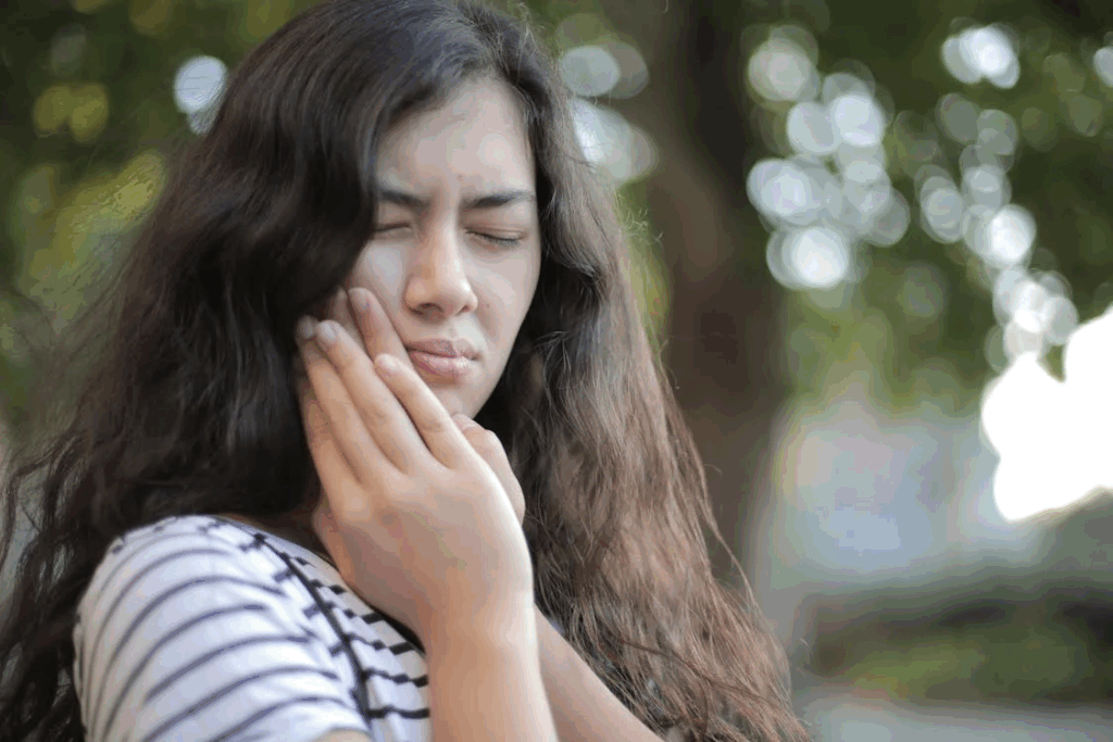 a woman having tooth pain